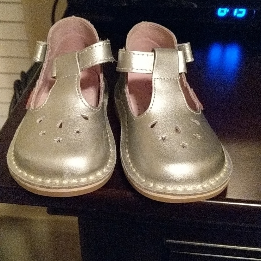 Silver t-strap shoea